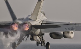 An EA-18 Growler taking off from the flight deck of USS George H.W. Bush.