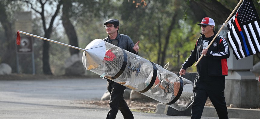 The scene at a Nov. 1, 2021 protest of the federal contractor vaccination mandate outside NASA's Jet Propulsion Laboratory in Pasadena, Calif.