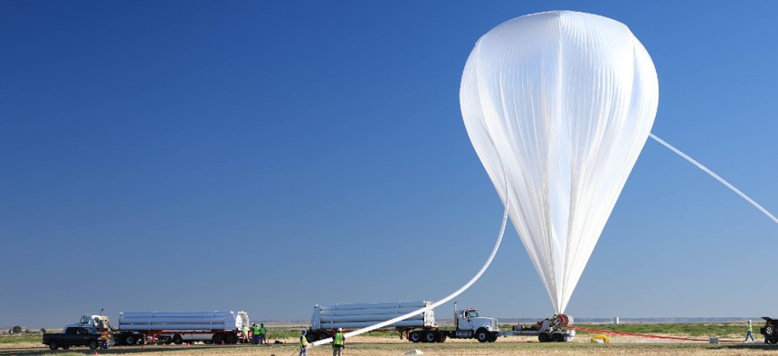A scientific balloon launching from NASA's Columbia Scientific Balloon Facility in Fort Sumner, New Mexico, in 2019.
