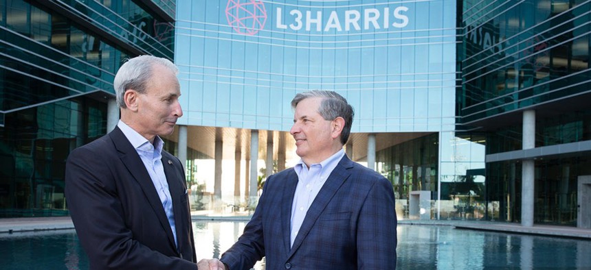 (Right to left) L3Harris CEO Chris Kubasik with Philip Bilden, Shield Capital chairman and managing partner