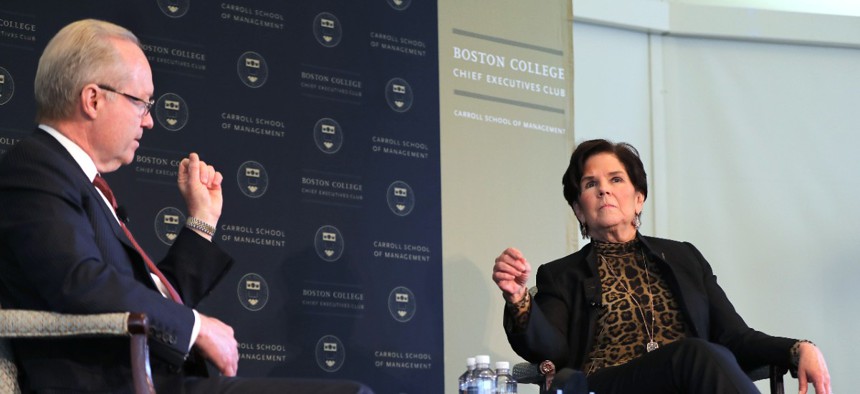 General Dynamics CEO Phebe Novakovic is seen here being interviewed by Raytheon CEO Thomas Kennedy during the Boston College Chief Executives Club luncheon in Boston on June 11, 2019.