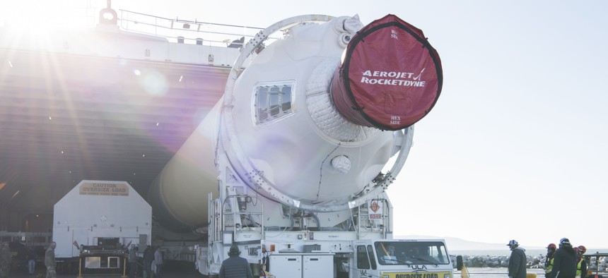 A Delta IV rocket is unloaded at Vandenburg Air Force Base in California.