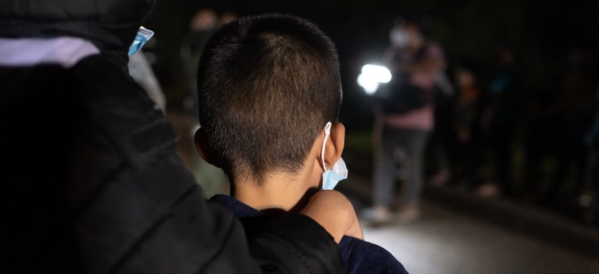 An unaccompanied child waits to be processed at the Texas border in April 2021.