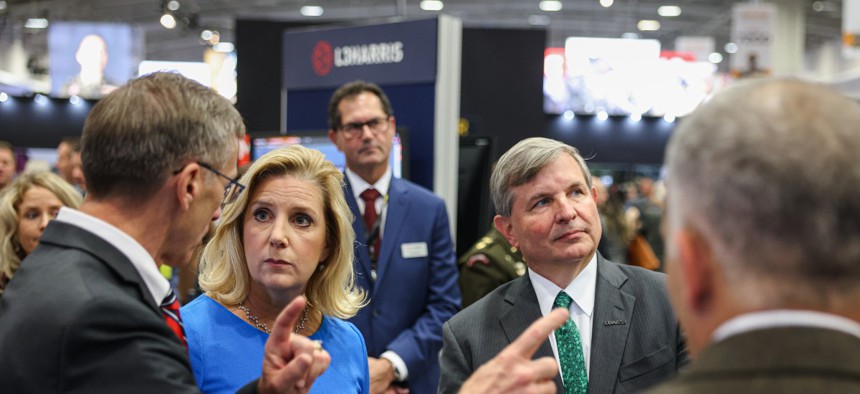 Army Secretary Christine Wormuth with L3Harris CEO Chris Kubasik at the 2022 AUSA Conference.