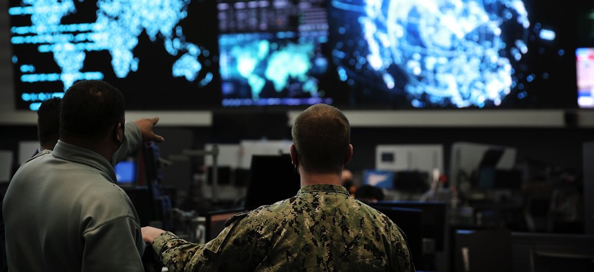 U.S. Cyber Command members work in the Integrated Cyber Center, Joint Operations Center at Fort George G. Meade, Md., April. 2, 2021.