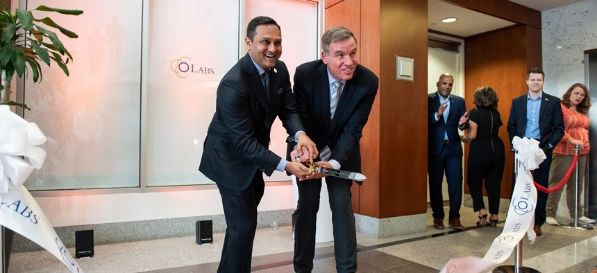 Octo CEO Mehul Sanghani (left) with Sen. Mark Warner (D-Virginia) at the oping of oLabs earlier this year.