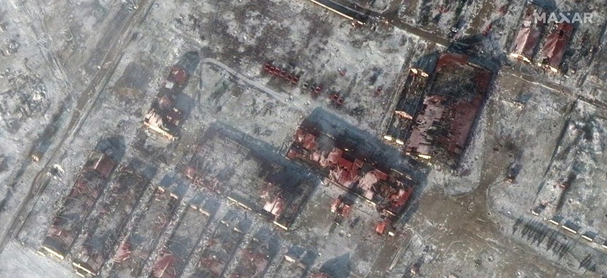 Maxar satellite (AFTER) imagery showing destroyed farm buildings in Yakovlivka, Ukraine.