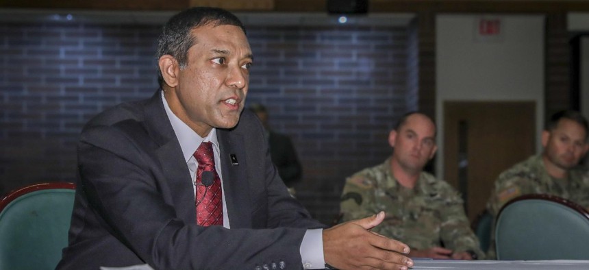 Raj Iyer addresses an audience on Oct. 5, 2022 in the McChord Club Ballroom at Joint Base Lewis-McChord, Washington.