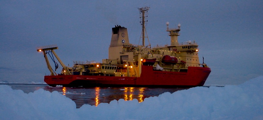 The research vessel Nathaniel B. Palmer cruises the darkened waters of Marguerite Bay on the Antarctic Peninsula. 