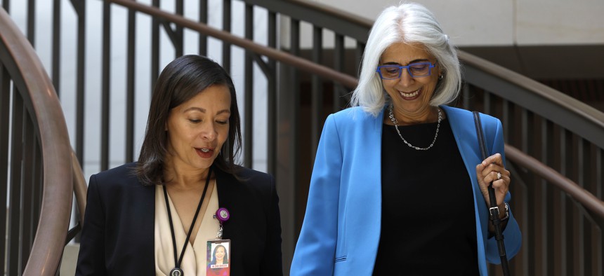 Arati Prabhakar (R), the director of the White House Office of Science and Technology Policy, arrives to brief senators on AI at the U.S. Capitol Building on July 11, 2023.