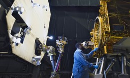 A techician tests satellite servicing technologies at Goddard Space Flight Center.