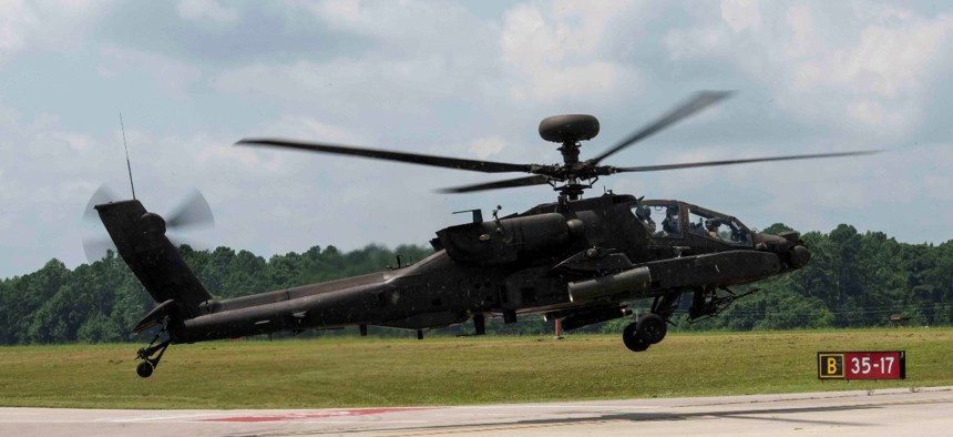 An AH-64E Apache helicopter returns from a July 13-Aug. 4, 2021 demonstration flight at Redstone Army Airfield in Alabama.