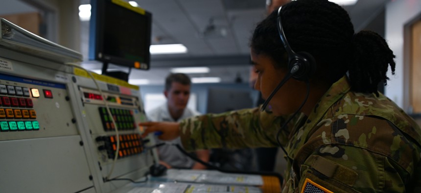 2nd Lt. Taylor Latimer, 2nd Range Operations Squadron range operations commander, walks industry partners through a simulated console exercise at Vandenberg Space Force Base, Calif., June 24, 2022. 