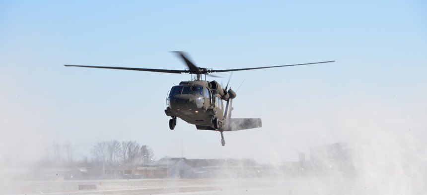 A U.S. Army UH-60 Black Hawk helicopter with the 38th Combat Aviation Brigade, Indiana Army National Guard lands at Terre Haute Regional Airport, Terre Haute, Ind., Jan. 4, 2018.