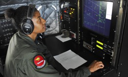 Technical Sgt. Latisha Russell, 82nd Aerial Target Squadron airborne mission systems operator, monitors the sea surveillance radar on the E-9A Widget in 2016.