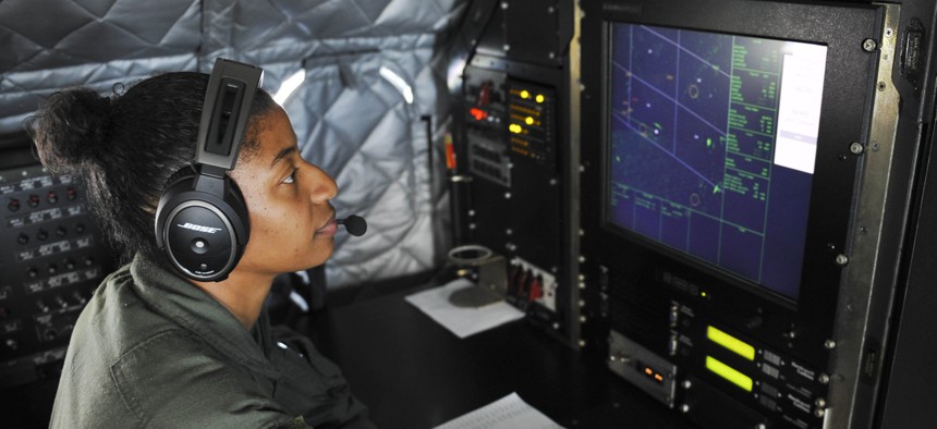 Technical Sgt. Latisha Russell, 82nd Aerial Target Squadron airborne mission systems operator, monitors the sea surveillance radar on the E-9A Widget in 2016.