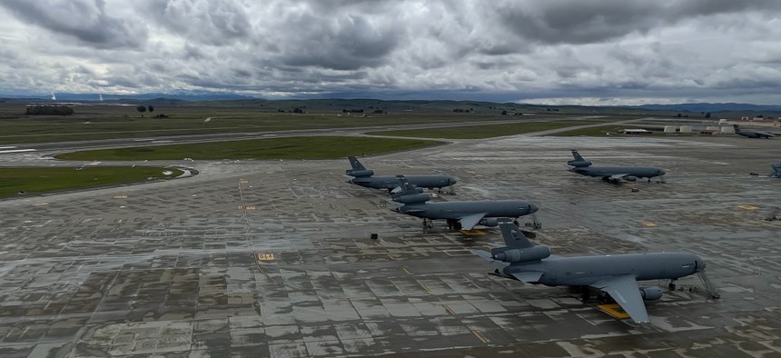 An Air Force KC-10 Extenders line tarmac in February 2023 at Travis Air Force Base, California.