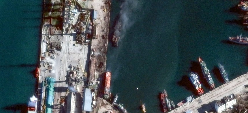 Maxar 'AFTER" satellite imagery of the reported attack on a Russian Ropucha-class landing ship at the eastern Crimean port of Feodosia.