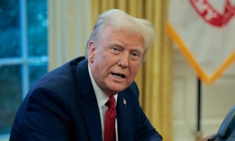 President Trump talking to reporters in the Oval Office on Jan. 30.