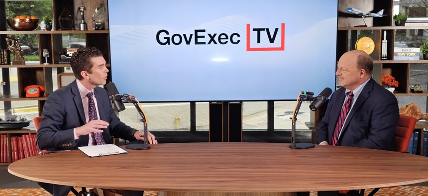 GovExec Vice President of Events George Jackson (L) and GSA Associate Administrator for Governmentwide Policy and Chief Acquisition Officer Larry Allen discuss the agency's procurement approach.
