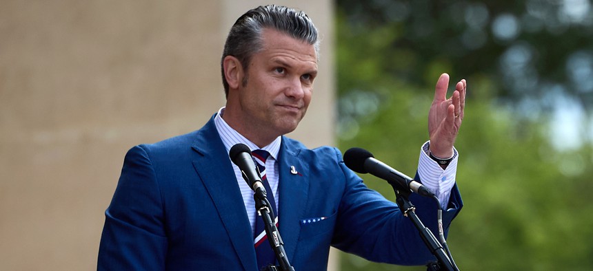 US Secretary of Defense Pete Hegseth gestures as he speaks during a ceremony at the Normandy American Cemetery to mark the 81st anniversary of the D-Day landings during World War II on June 06, 2025 in Colleville-sur-Mer, France