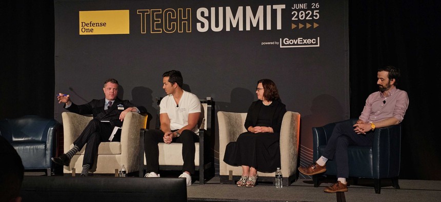 Defense One's Patrick Tucker, left, leads a discussion with Shield AI's Brandon Tseng, OpenAI's Katrina Mulligan, and David Payne, of DIU Strategic Initiatives, at the Defense One Tech Summit in Arlington, Virginia, on June 26, 2025.