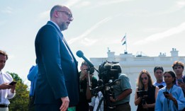 OMB Director Russell Vought speaks with reporters outside the White House on July 17.