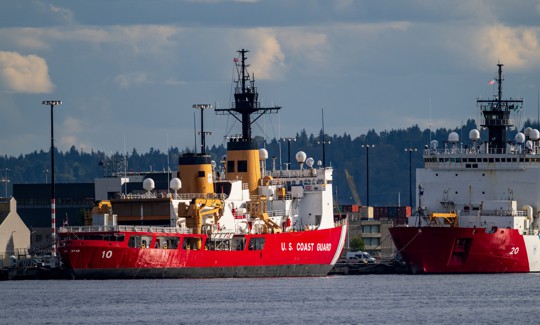 Coast Guard vessels in port at Seattle being readied for their next mission.