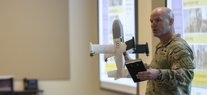U.S. Army Brig. Gen. Matt Ross delivers remarks at a JIATF 401 Interagency Summit at the Mark Center, Alexandria Va., Nov. 25, 2025.