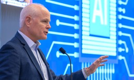 Leidos CEO Tom Bell speaking at Leidos leadership conference in October.