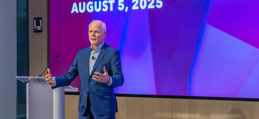 Leidos CEO Tom Bell speaking at a quarterly employee town hall event on Aug. 5.