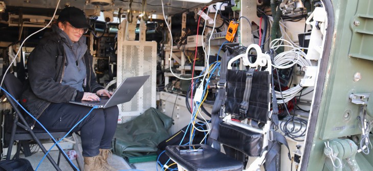 An engineer with the Army's C5ISR Center works on ways to use 5G technology to push data to the tactical edge using soldiers’ existing devices at Joint Base McGuire-Dix, New Jersey, on Jan. 7, 2026.