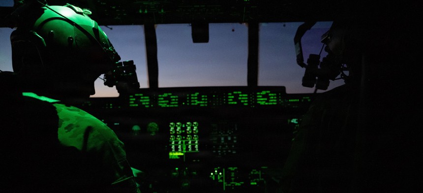 U.S. Air Force pilots prepare for take off in a C-130J in the U.S. Central Command area of responsibility during Operation Epic Fury, March 10, 2026.