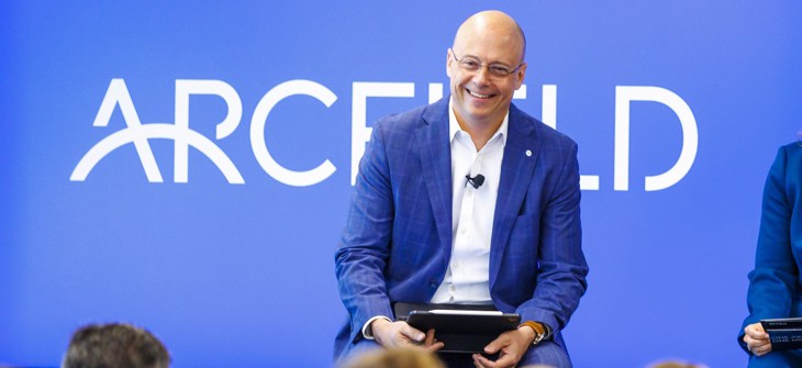 Arcfield's CEO Kevin Kelly addresses employees at a company town hall event.