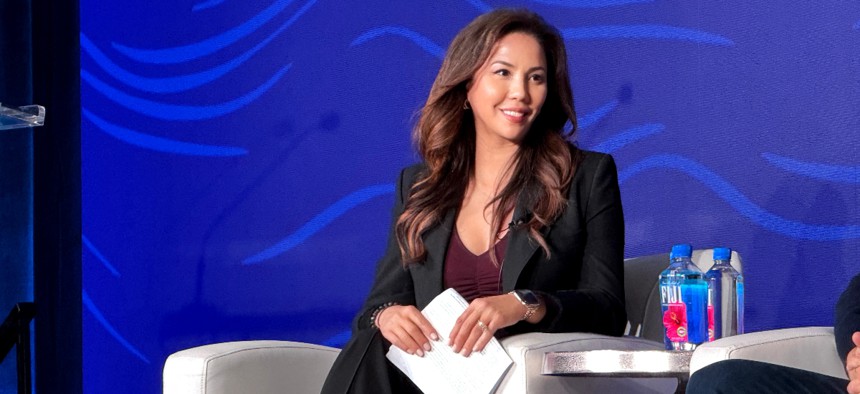 Noblis CEO Mile Corrigan moderating a panel at the GCVI Summit 2026 conference in Monterey, California.