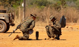 U.S. Marine riflemen with 5th Marine Regiment conduct radio communication training on Aug. 9, 2023, at the Base Expedicionaria de Fuzileiros Navais in Formosa, Brazil.