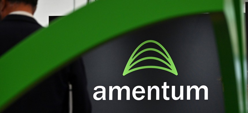 Amentum's logo on display at the Defense Security Equipment International in September 2025 in London.