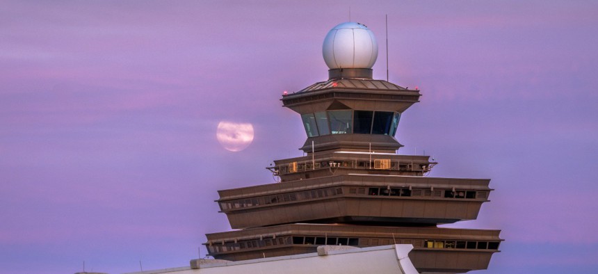 The air traffic control tower at Washington Dulles International Airport in May 2025.