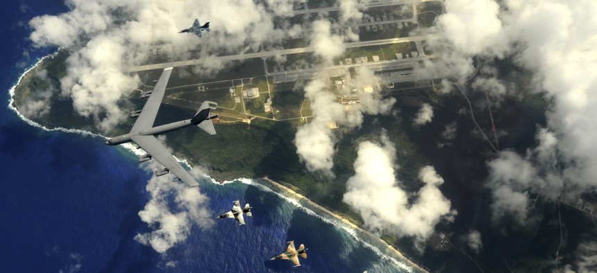 A B-52 bomber flying over the Anderson Air Force Base on Guam.
