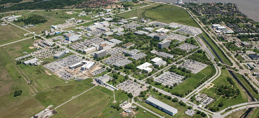 Aerial photograph of Johnson Space Center facilities taken from a U.S. Coast Guard H-65 helicopter.