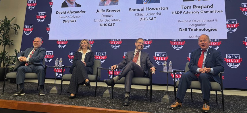 Dr. David Alexander, senior science advisor at DHS S&T; Julie Brewer, deputy undersecretary for science and technology at DHS; Dr. Samuel Howerton, chief scientist at DHS S&T; and Tom Ragland, homeland security integrations executive at Dell Technologies, speak during an event hosted by the Homeland Security & Defense Forum in Washington, D.C., on Sept. 22, 2026.