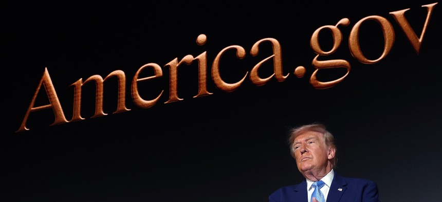 President Donald Trump applauds on stage during the America.gov launch event at Andrew W. Mellon Auditorium on September 29, 2026 in Washington, DC.