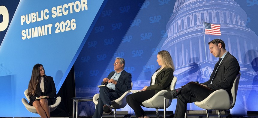 Navy Chief Technology Officer Justin Fanelli (far right) speaking at the SAP Public Sector Summit on Oct. 15.